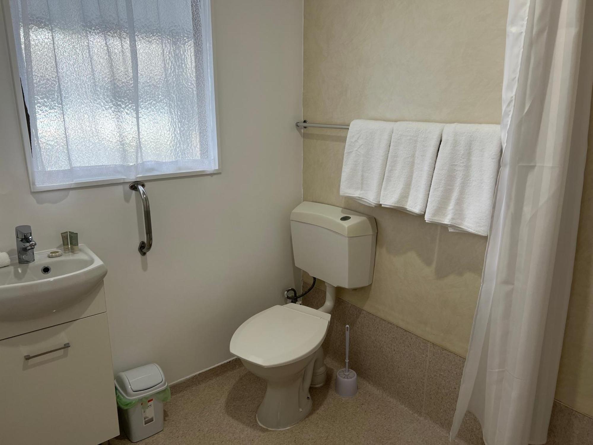 אופוטיקי Magnolia Court Motel מראה חיצוני תמונה